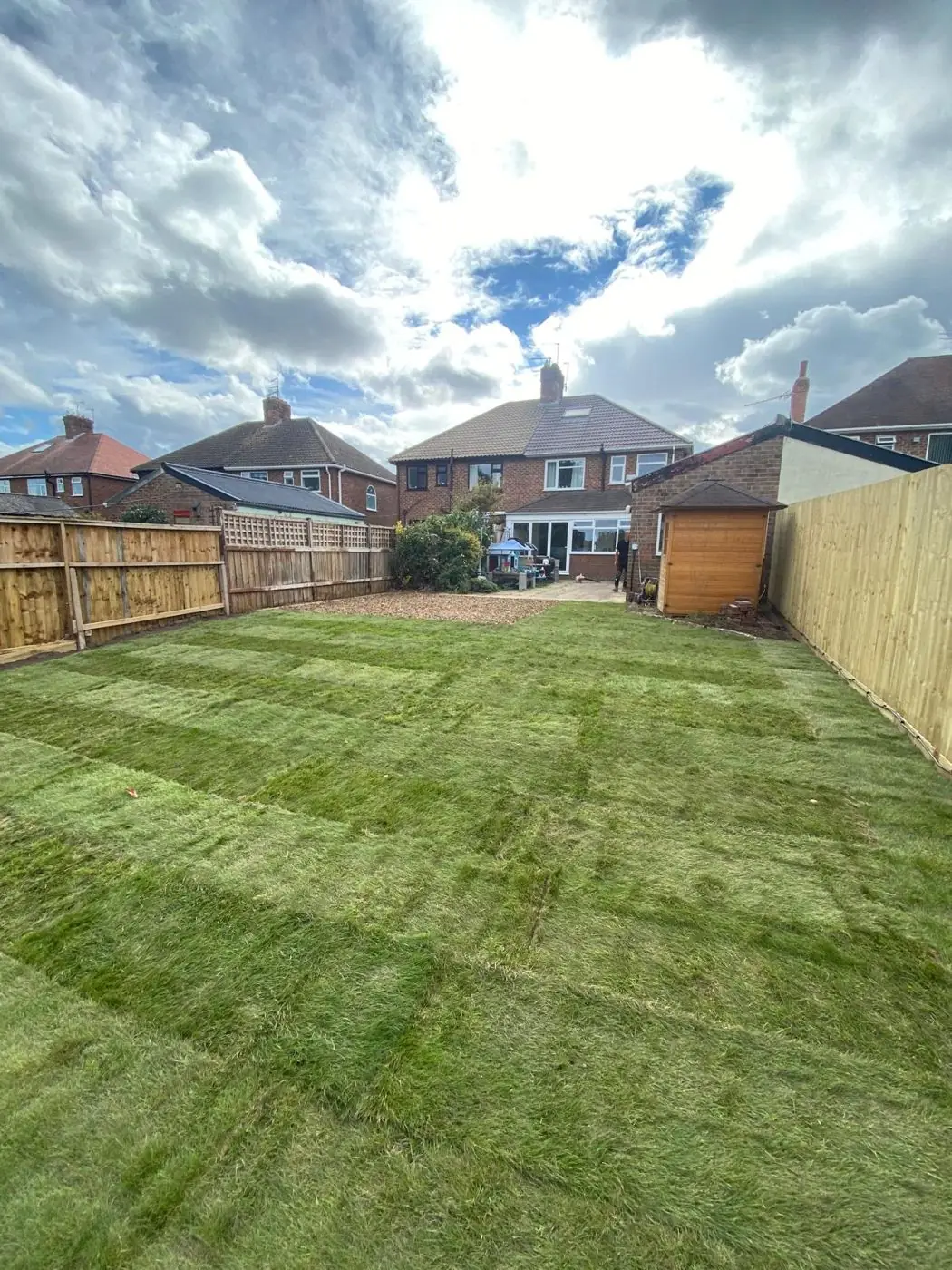 New lawn turfed and new fencing installed
