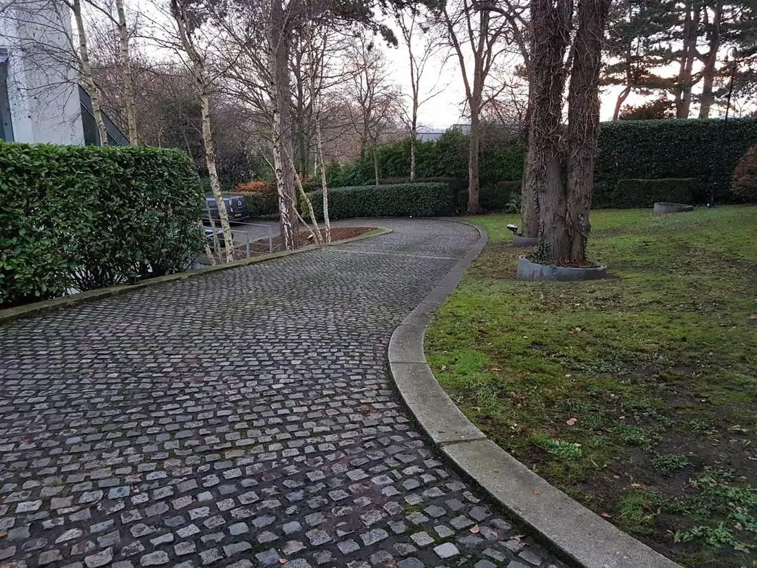 Cobbled drive swept clear of leaves